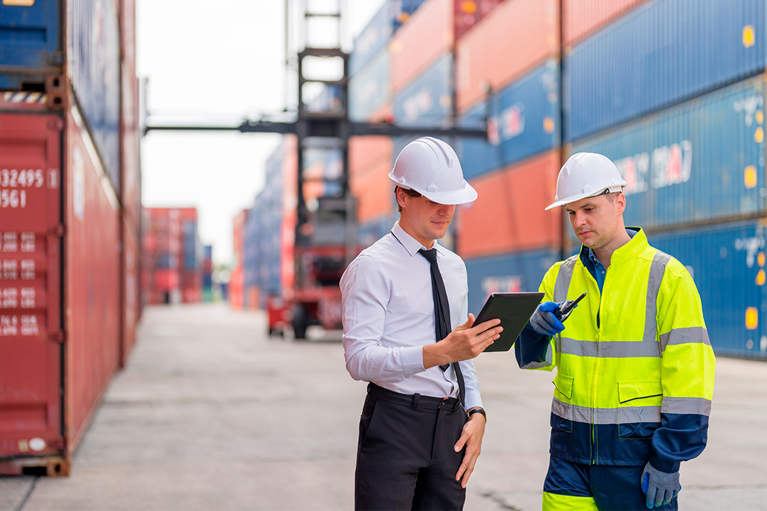 2 workers receiving storage mobile from cusomts