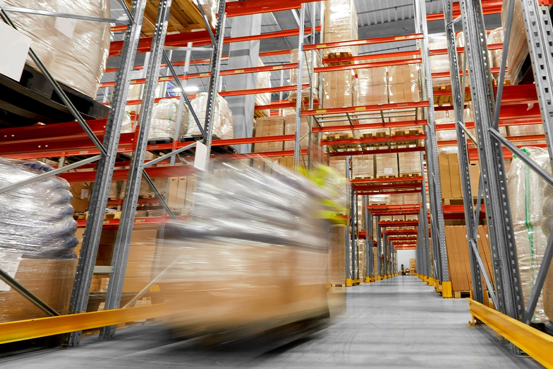 A warehouse scene featuring a forklift in motion, highlighting the benefits of third-party logistics in McAllen.