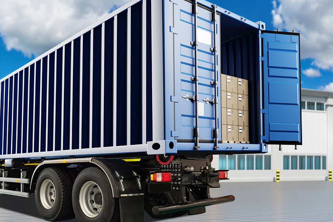 A blue cargo truck featuring a large container, emphasizing the utility of 20-foot shipping containers for small businesses.