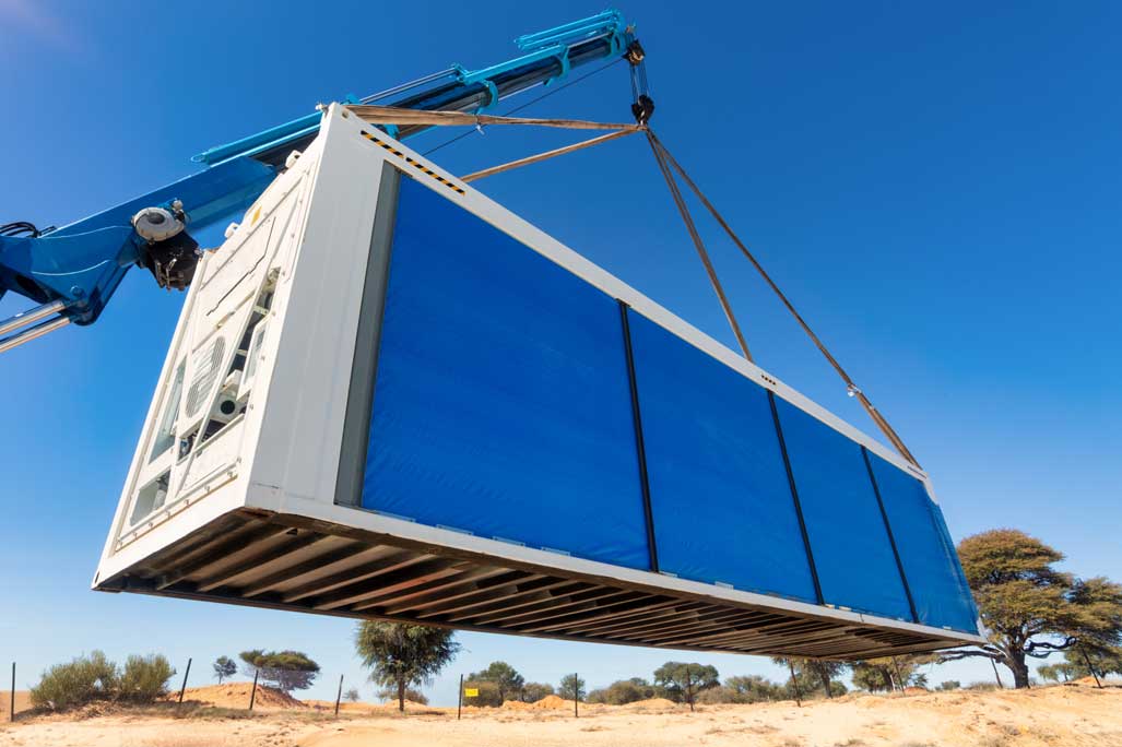 crane lifting refrigeration container on site, portable refrigeration container solutions